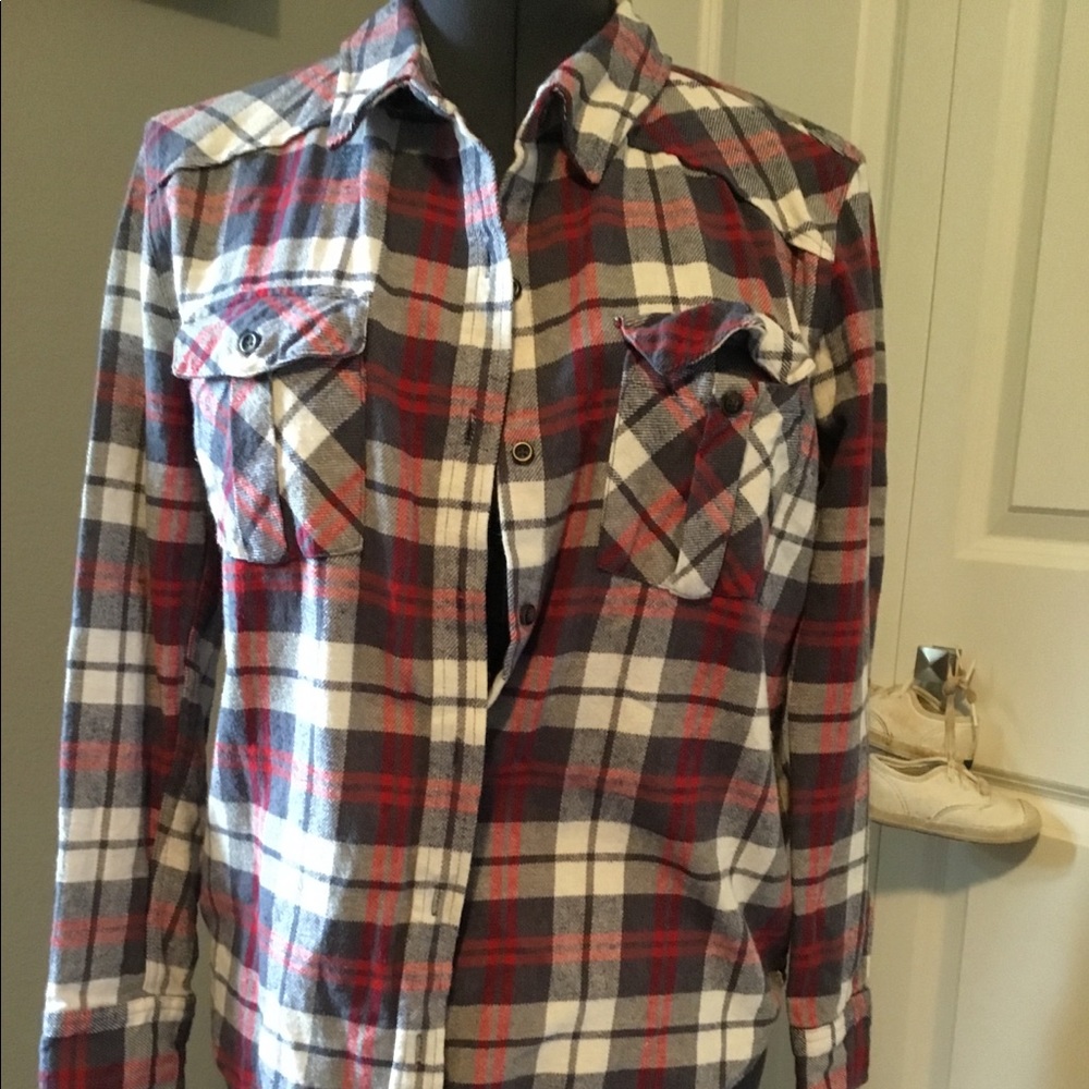 Long sleeve flannel shirt.